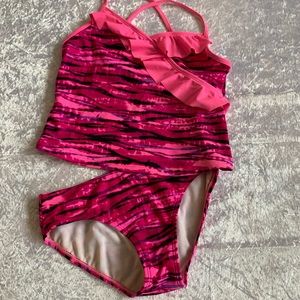 Xhilaration two piece, red and black brindle size 10–12.  Hot, pink, and black.